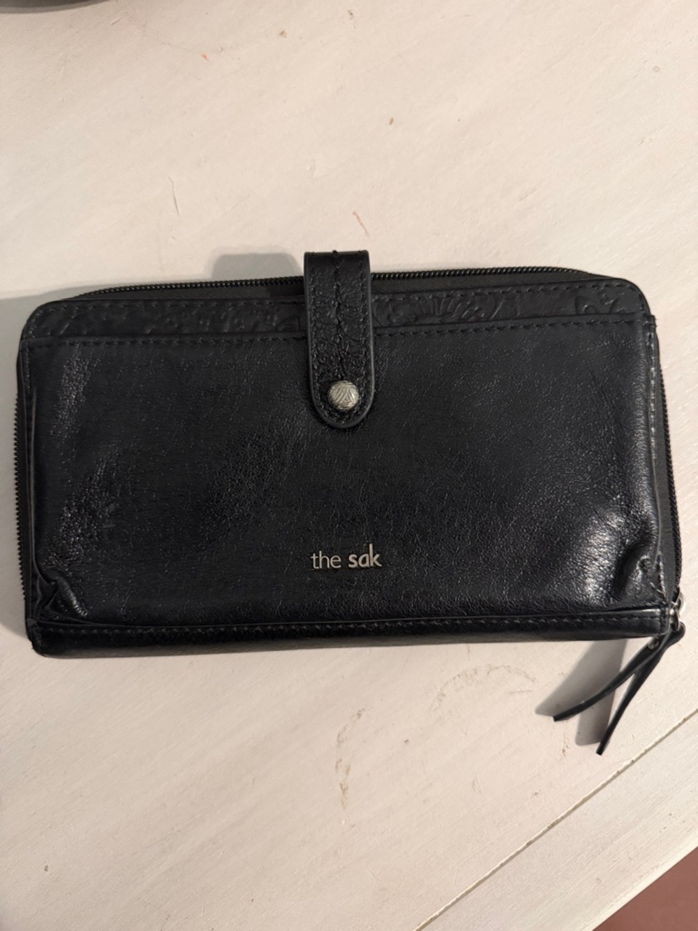 The Sak Black Leather Zip Wallet with Snap Tab